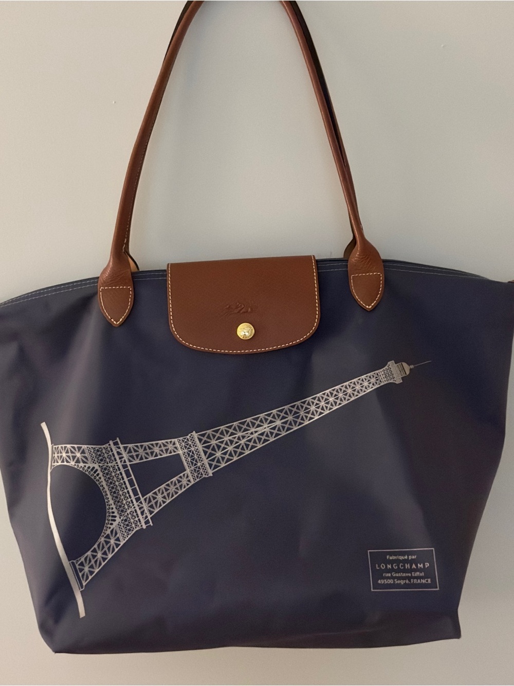 Longchamp 2010’s Limited Edition Blue Tote with Brown Leather Trim.